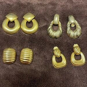 Four pairs of vintage clip on earrings